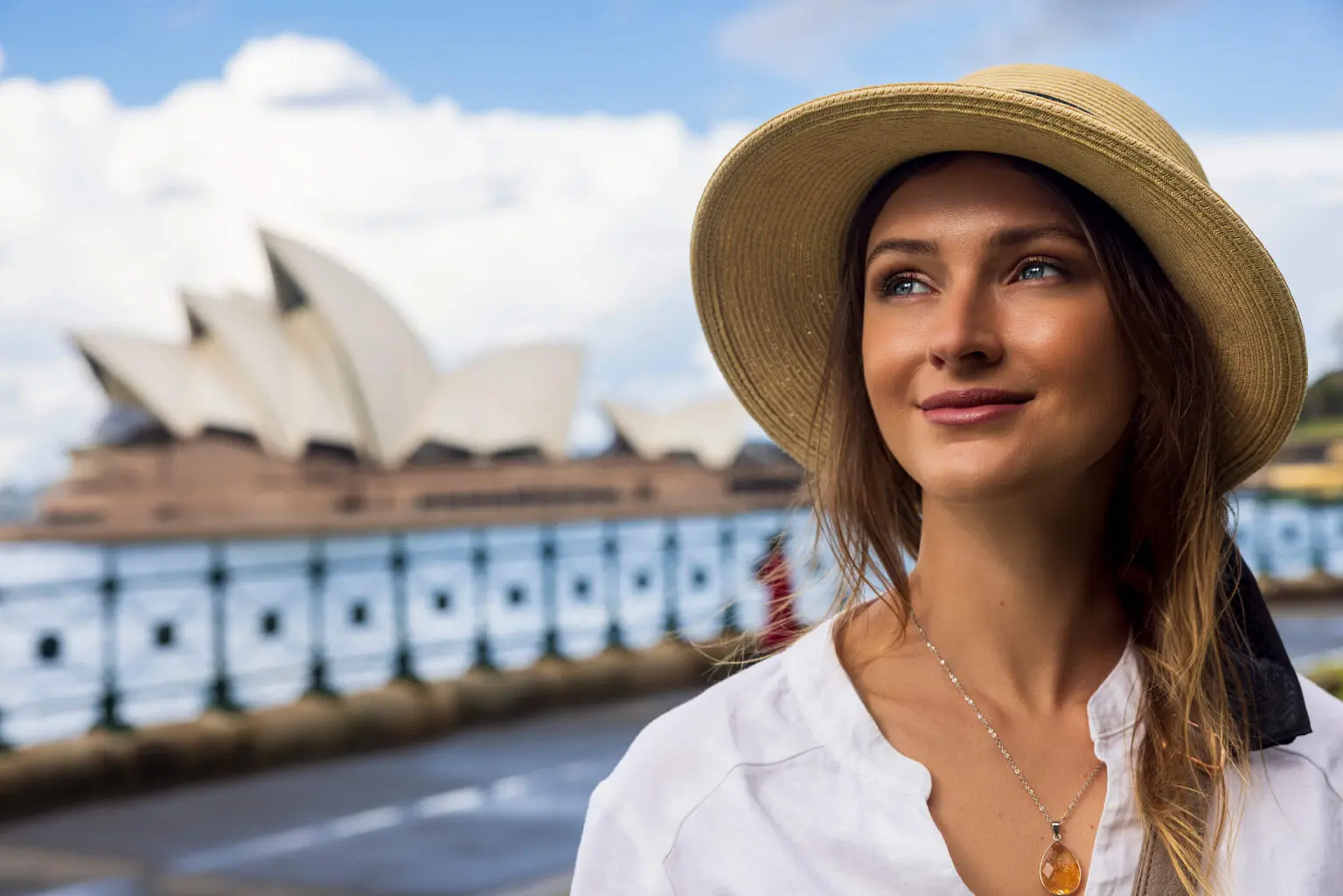 Women with Sydney opera house in background
