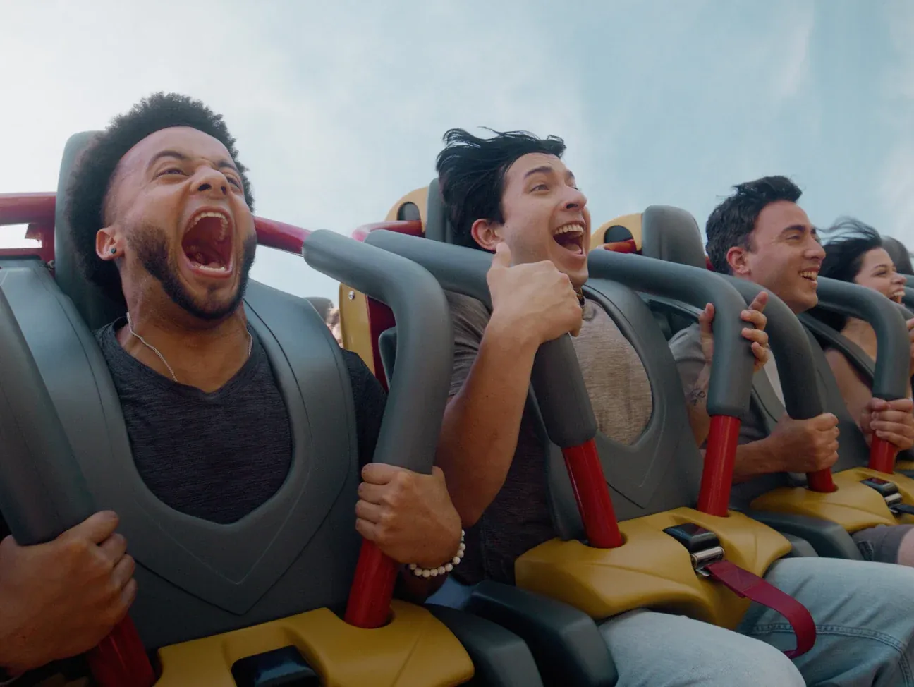 People on a roller coaster ride
